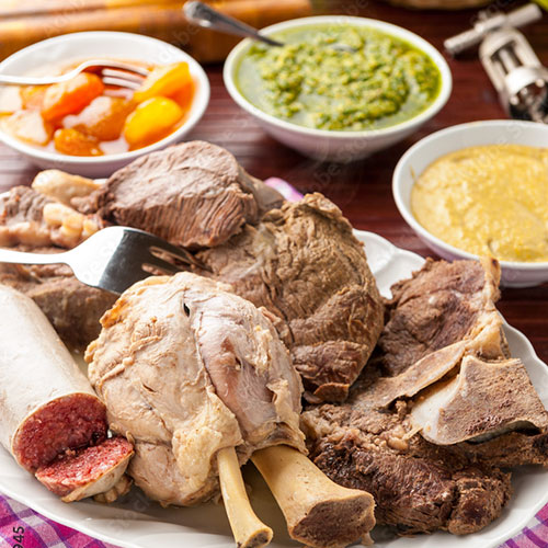 Piedmontese-style Bollito Misto lunch with boiled vegetables and sauces at the Rifugio Restaurant